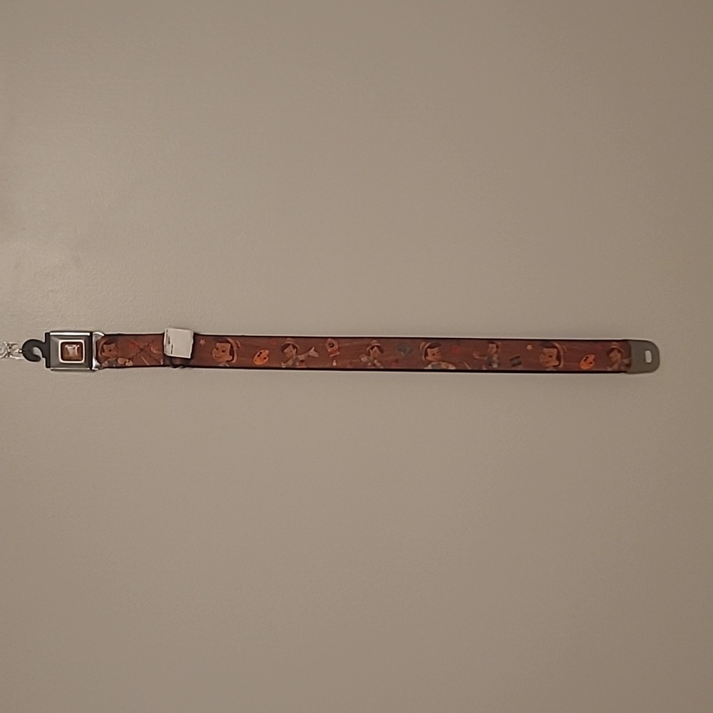 BUCKLE-DOWN Seat Belt Style Disney Pinocchio Print Belt NWT